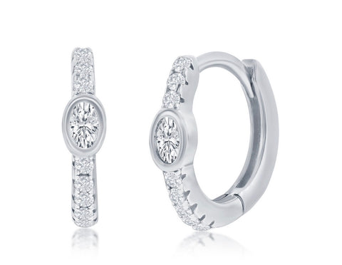 Sterling silver Mini Huggies with cz's and a cz oval shape in the center