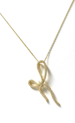 Vermeil over sterling silver cz long bow necklace.