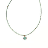 Mint colored beaded necklace with dangling flower