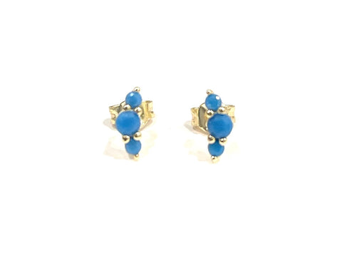 Vermeil over sterling silver with turquoise colored three stone stud earring.
