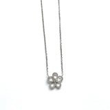 Sterling silver cz open flower necklace with a small round cz stone in the center.