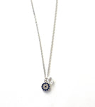 Sterling silver clear and sapphire colored cz's  evil eye with dangling crystal