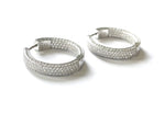Sterling silver pave cz inside out hoops.