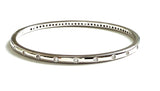 Vermeil over sterling silver bangle with small round cz stones going around the bangle.