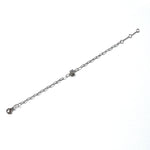 Sterling silver paperclip bracelet with round cz stone.