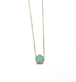 Vermeil over sterling silver turquoise flower outlined in cz's.
