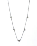 Sterling silver necklace with five , three cluster cz bezels.