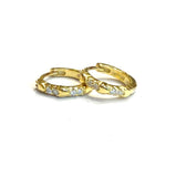 Vermeil over sterling silver cz small hoop earrings with gold hearts.