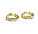 Vermeil over sterling silver cz small hoop earrings with gold hearts.