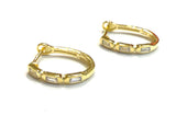 Vermeil over sterling silver oval hoop with clear baguette cz stones.