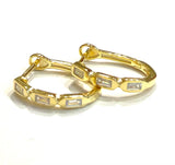 Vermeil over sterling silver oval hoop with clear baguette cz stones.