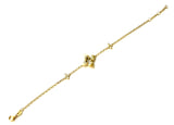 Vermeil over sterling silver chain bracelet with small cz clovers on the side and a center brushed gold and cz clover.