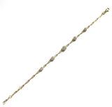 Vermeil over sterling silver paperclip chain bracelet with five cz cluster flowers.