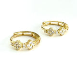 Vermeil over sterling silver cz clover huggie earrings.