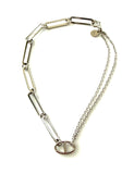 Vermeil over sterling silver 1/2 paperclip 1/2 double chain bracelet with a mariner link in the center.