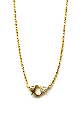 Vermeil over sterling silver beaded necklace with a cz lobster clasp.  Necklace is 17 inches.