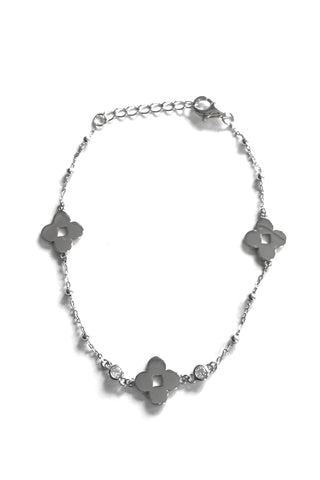 Sterling beaded and chain bracelet with  three clovers.  There are also two cubic zirconia small bezel stones. 
