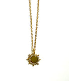 Vermeil over sterling silver cz chain necklace with a sun pendant.