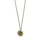 Sterling silver cz chain necklace with a sun pendant.