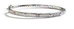 Sterling silver cubic zirconia bangle with alternating  diamond and round cubic zirconia stones.