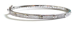 Sterling silver cubic zirconia bangle with alternating  diamond and round cubic zirconia stones.
