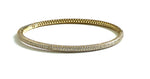 Vermeil over sterling silver bangle bracelet with pave stones going around.