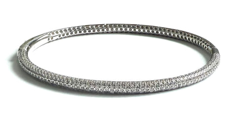 Sterling silver bangle bracelet with pave stones going around.