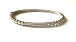 Sterling silver beaded bracelet with a cz bar.
