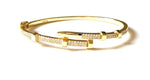 Vermeil over sterling silver bolt nailhead cubic zirconia bangle bracelet.