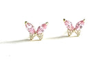 Vermeil over sterling silver butterfly stud earring with clear and pink colored cubic zirconia stones.