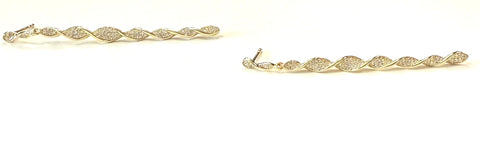 Vermeil over sterling silver cz earrings with a long twirly drop.