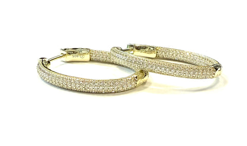 Vermeil over sterling silver pave cz oval inside out hoop earrings.