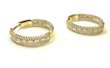 Vermeil over sterling silver and cubic zirconia baguette & Round CZ Inside Out Hoop Earrings.