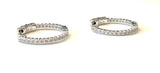 Sterling silver inside out cz hoop earrings.