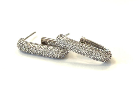 Sterling silver long cz pave hoop earrings.