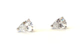 Sterling silver three pronged 5mm cubic zirconia pear shaped stud earrings.