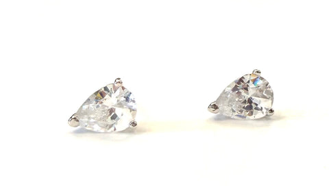 Sterling silver three pronged 5mm cubic zirconia pear shaped stud earrings.
