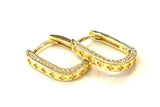 Vermeil over sterling silver hoop earrings with cubic zirconia stone sides.