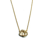 Vermeil over sterling silver chain necklace with a cubic zirconia interlocking heart pendant.