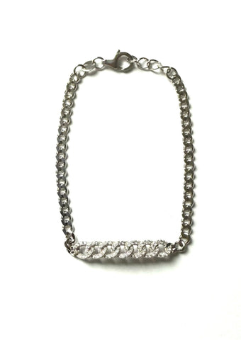 Sterling silver cuban chain bracelet with a cubic zirconia cuban chain bar.