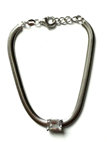 Sterling silver snake chain with a cz emerald shaped stone.
