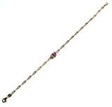 Vermeil over sterling silver paperclip bracelet with a clear cz pear shaped stone and a pink cz heart shaped stone.