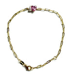 Vermeil over sterling silver paperclip bracelet with a clear cz pear shaped stone and a pink cz heart shaped stone.