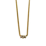 Vermeil over sterling silver herringbone chain with Cubic Zirconia  triple marquis bezel pendant.