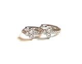 Sterling silver cz huggie earrings with a cz triple cluster.