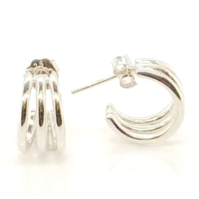 Sterling silver triple row huggie earrings.