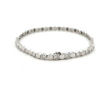 Sterling silver octagon shaped alternating tennis bracelet with Moissanite stones.