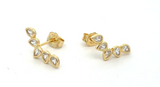 Vermeil over sterling silver pear shaped climber stud earrings with cubic zirconia stones.