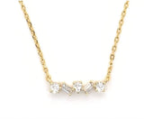 Vermeil over sterling silver alternating baguette and round cz stones necklace.