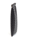 Black basketweave squeeze top closure eye glass case.
